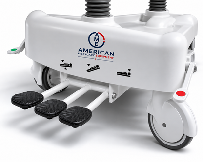 Three independent hydraulic foot pedals on the oversized embalming table for hands-free height and tilt control | American Mortuary Coolers