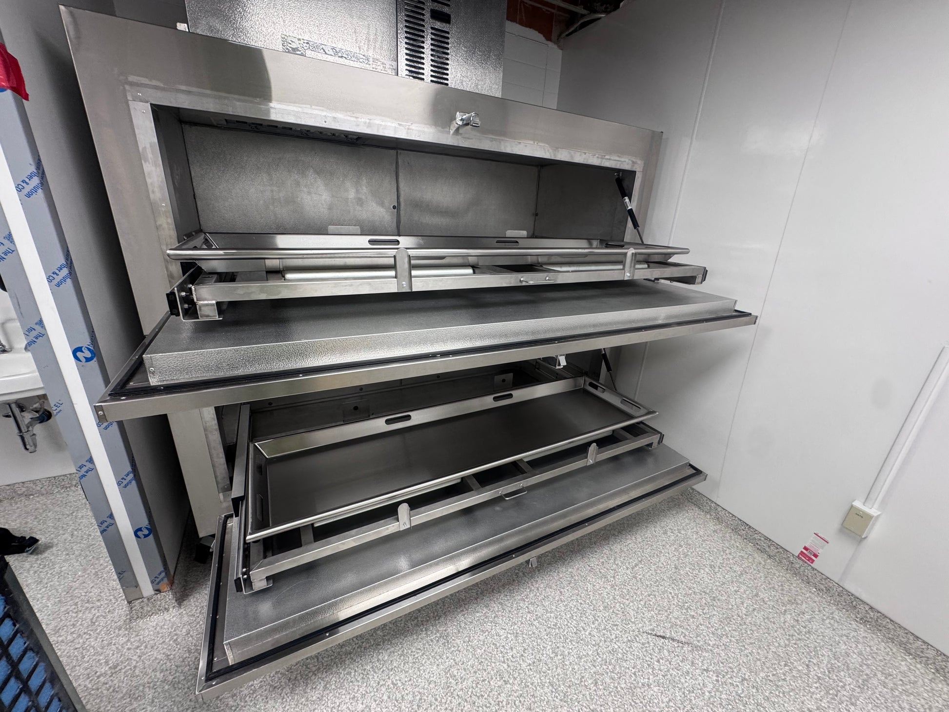 Model 1070-2MBS bariatric vault morgue cooler, full-extension telescoping tray rails
