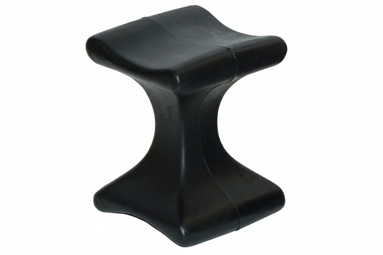 Multi-position polyvinyl soft prep block for embalming featuring 6-way curvature for head and limb support.